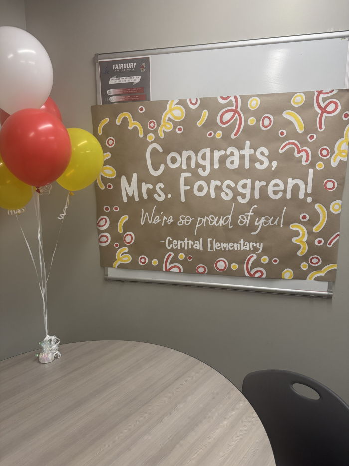 a banner with balloons saying congrats Mrs. Forsgren