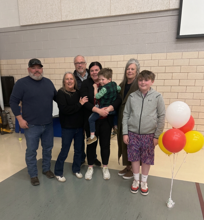 people posing for a group photo