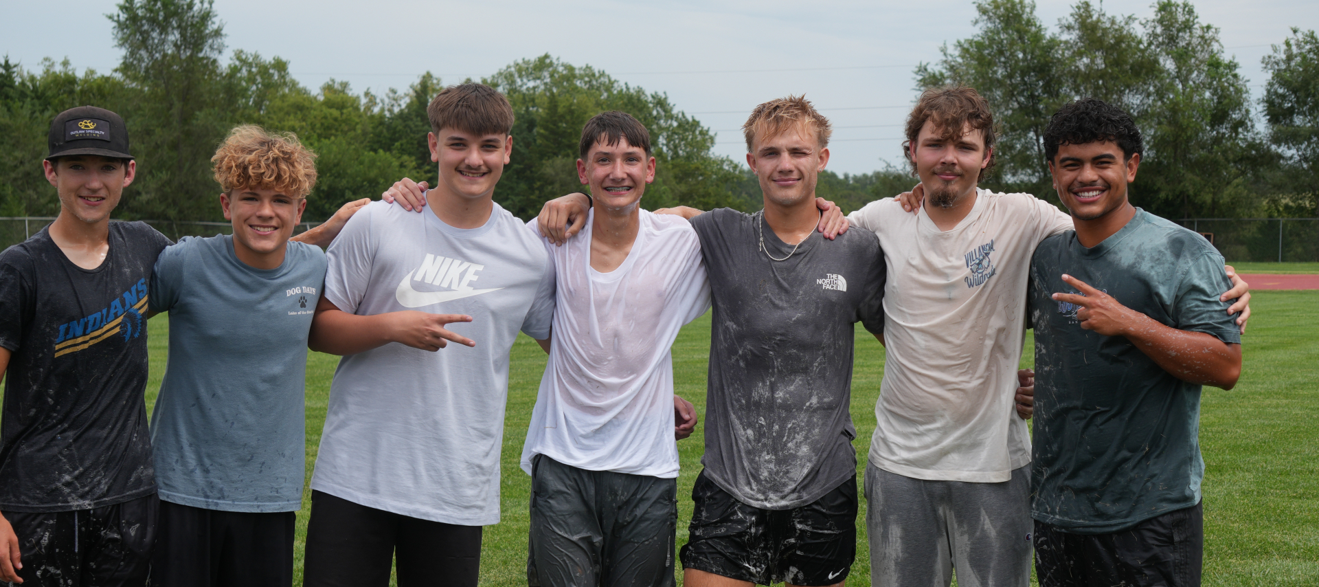 7 boys smiling