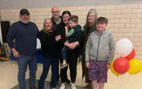 people posing for a group photo